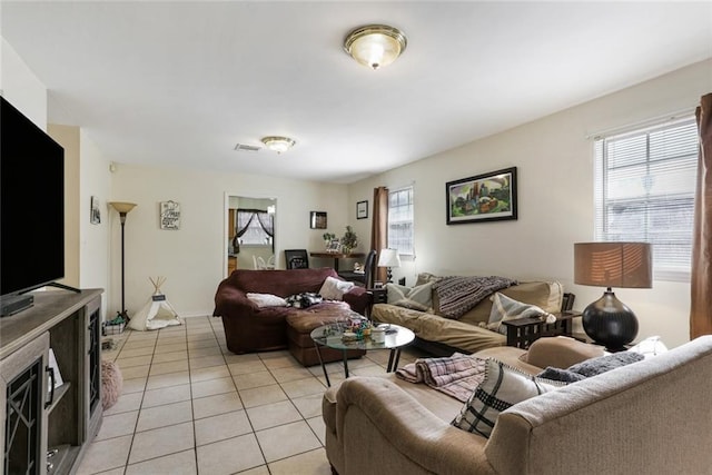 living room featuring light tile patterned flooring