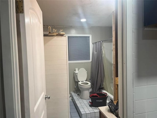 bathroom featuring toilet