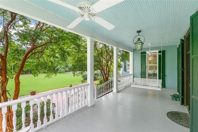 view of patio / terrace with a porch and ceiling fan