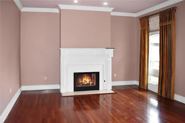 unfurnished living room featuring ornamental molding and dark hardwood / wood-style flooring