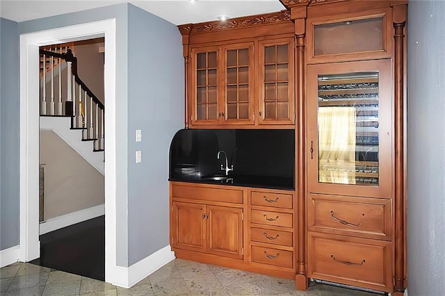 bar featuring sink and wine cooler