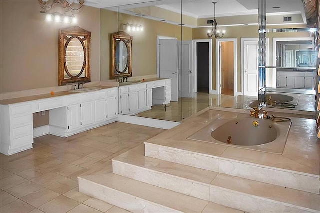 bathroom featuring tiled tub, vanity, and ornamental molding