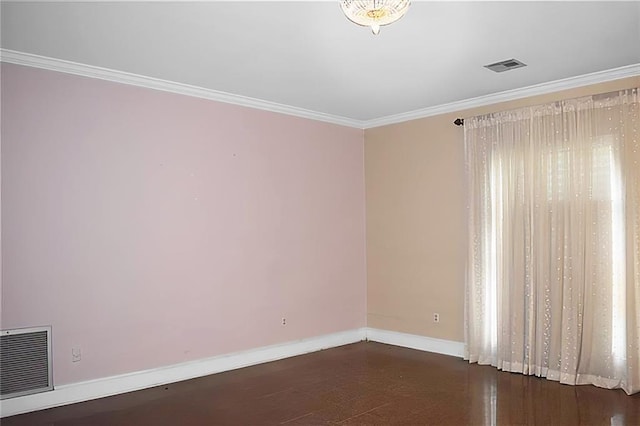 unfurnished room featuring crown molding and dark wood-type flooring