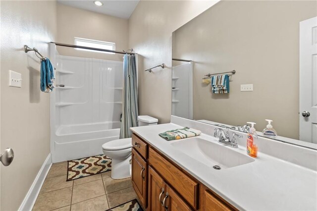 full bathroom with vanity, tile patterned flooring, toilet, and shower / tub combo with curtain