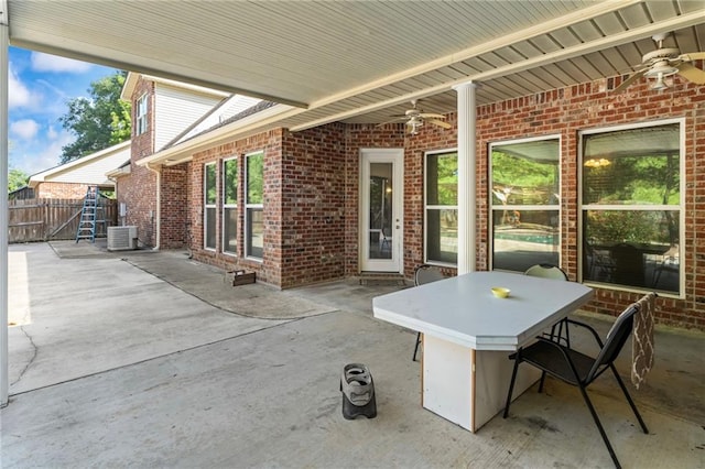 view of patio with cooling unit and ceiling fan