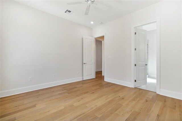 unfurnished bedroom featuring ceiling fan and light hardwood / wood-style floors