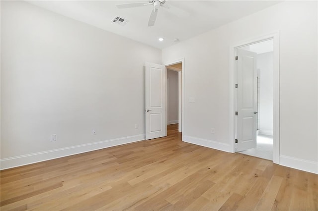 unfurnished bedroom featuring ceiling fan and light wood-type flooring