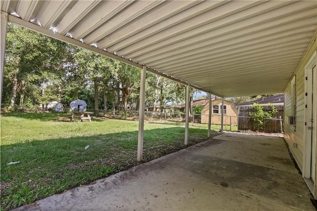 view of patio / terrace with a storage unit