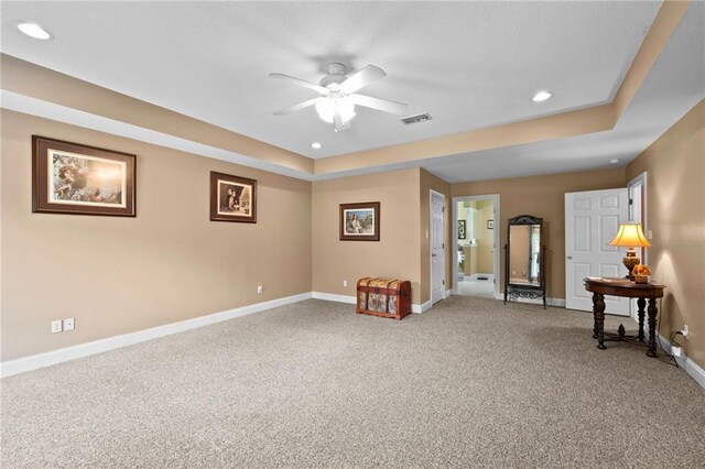 17 P M Hall Rd, Poplarville, MS 39470 - sitting room featuring carpet floors, a tray ceiling, and ceiling fan