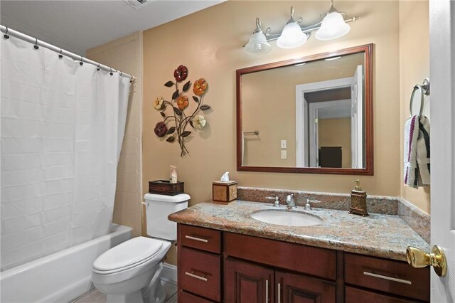 17 P M Hall Rd, Poplarville, MS 39470 - full bathroom featuring shower / bath combination with curtain, toilet, and vanity