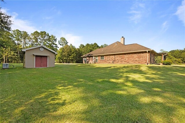 17 P M Hall Rd, Poplarville, MS 39470 - view of yard featuring an outdoor structure
