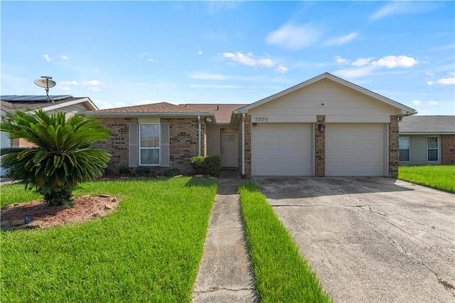 single story home with a garage and a front yard