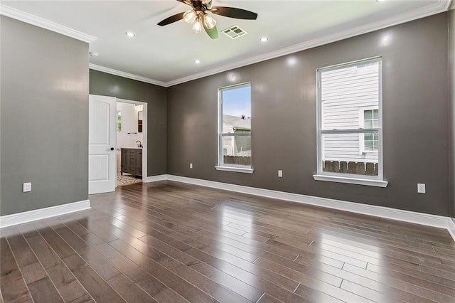 unfurnished room featuring dark hardwood / wood-style floors, ceiling fan, and ornamental molding