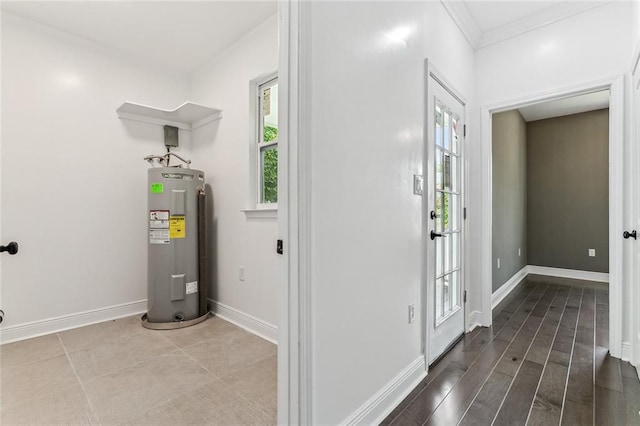 utility room featuring electric water heater