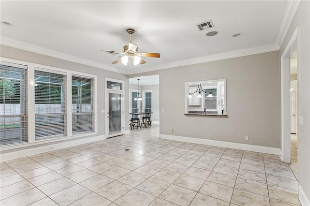 tiled spare room with crown molding and ceiling fan