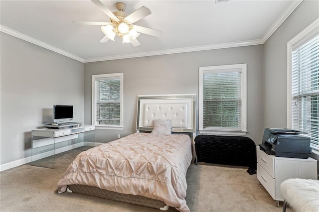 bedroom with crown molding, ceiling fan, and light colored carpet