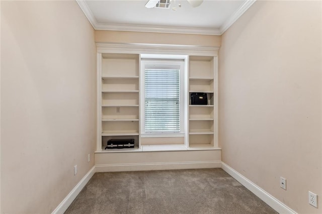 carpeted empty room with ornamental molding