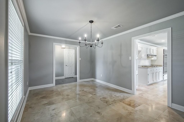 unfurnished dining area featuring ornamental molding and a chandelier