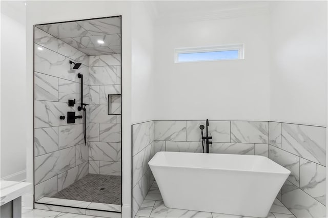 bathroom with tile walls, separate shower and tub, tile patterned floors, and ornamental molding