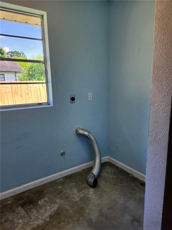 laundry area with electric dryer hookup