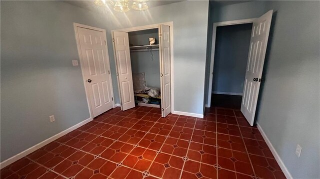 unfurnished bedroom featuring a closet