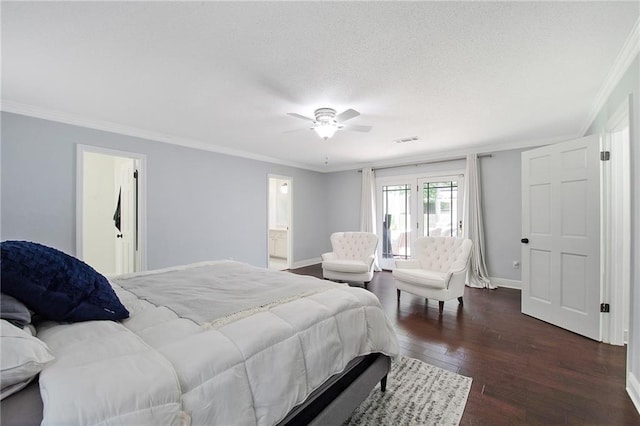 bedroom featuring dark hardwood / wood-style floors, ensuite bath, ceiling fan, and crown molding