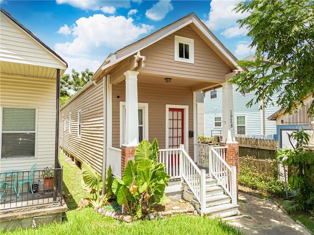 view of front of property featuring covered porch