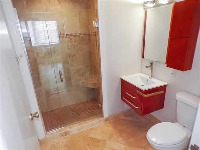 bathroom featuring vanity, toilet, walk in shower, and tile patterned flooring