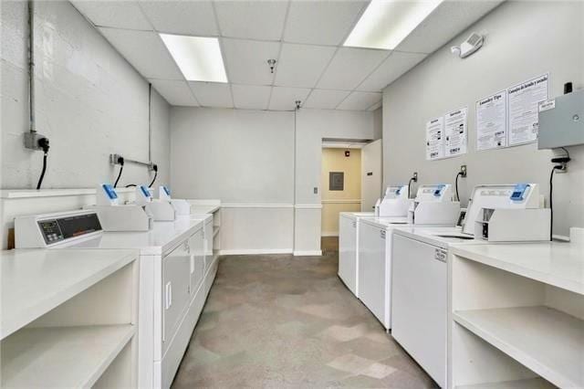 clothes washing area featuring washing machine and dryer