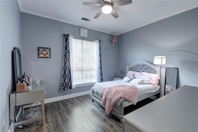 bedroom with ceiling fan, ornamental molding, and hardwood / wood-style floors