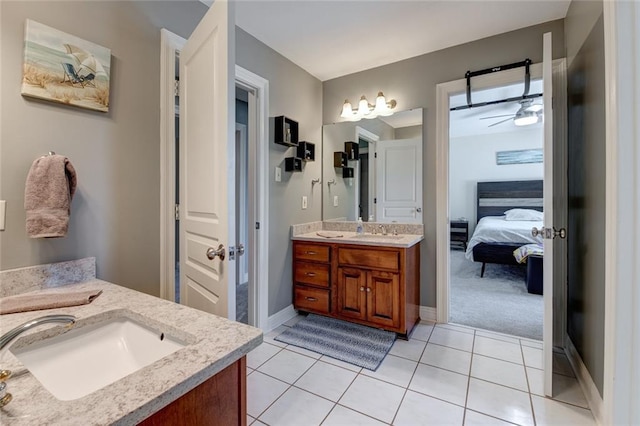 bathroom featuring vanity, ceiling fan, and tile patterned flooring