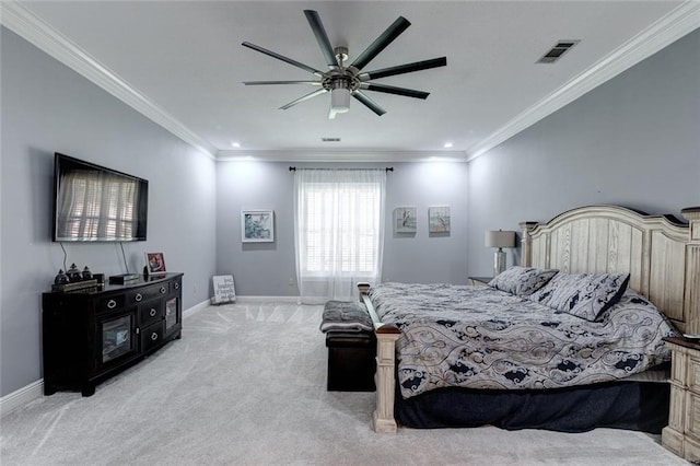 bedroom featuring ceiling fan, light carpet, and ornamental molding