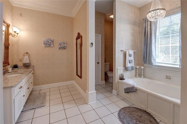 bathroom with toilet, vanity, crown molding, a bathtub, and tile patterned flooring