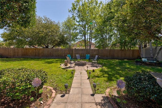 view of yard featuring a fire pit