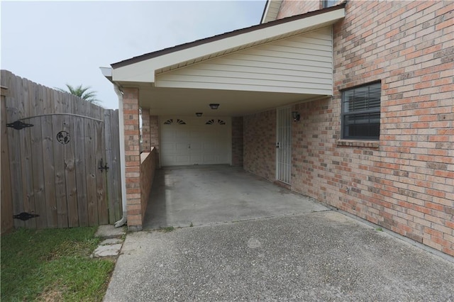 exterior space featuring a garage and a carport