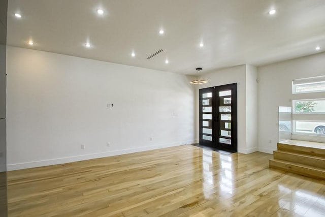 4317 Anthony St, Metairie, LA 70001 - foyer featuring light wood-style floors, baseboards, and recessed lighting