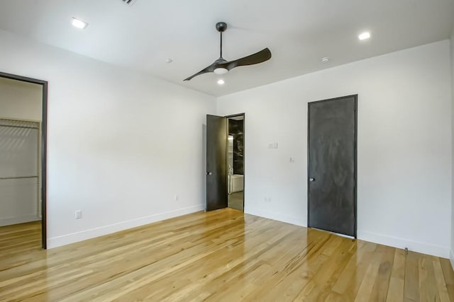 4317 Anthony St, Metairie, LA 70001 - unfurnished bedroom featuring light wood finished floors, a closet, baseboards, and recessed lighting