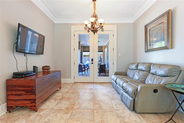 living room with french doors, crown molding, and a chandelier