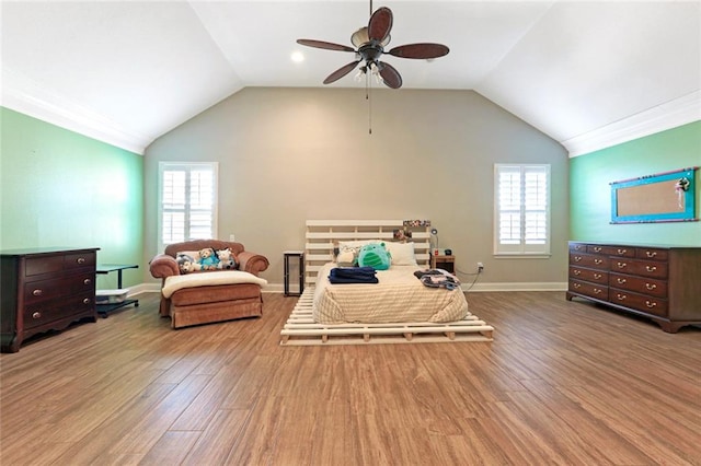 interior space featuring light hardwood / wood-style floors, vaulted ceiling, and ceiling fan