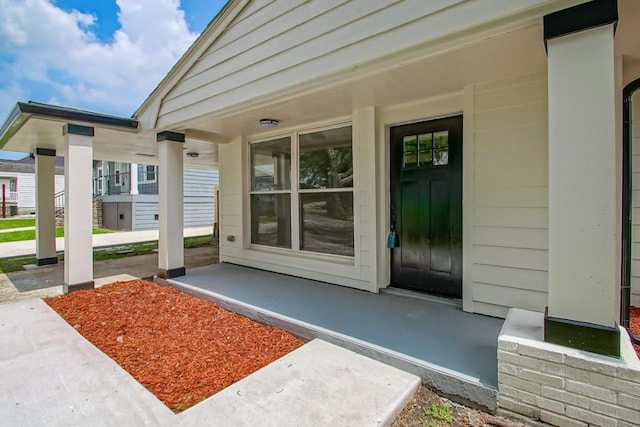 property entrance with a porch