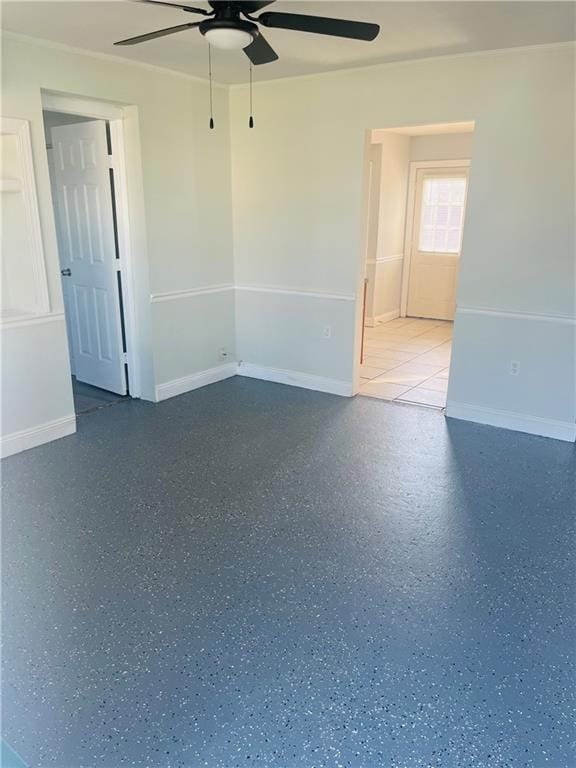 unfurnished room featuring ceiling fan