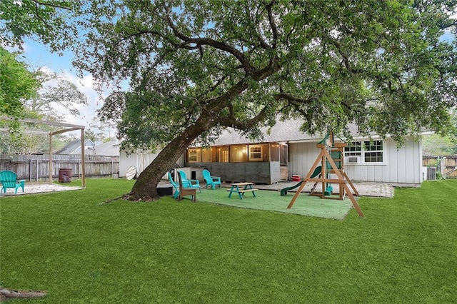 view of yard with a playground