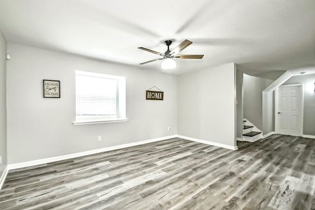 empty room featuring ceiling fan and wood-type flooring