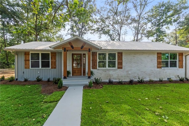 ranch-style house with a front lawn