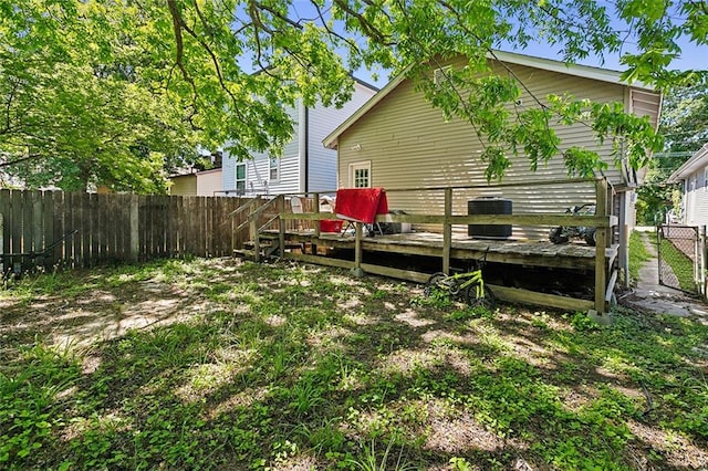 view of yard with a wooden deck