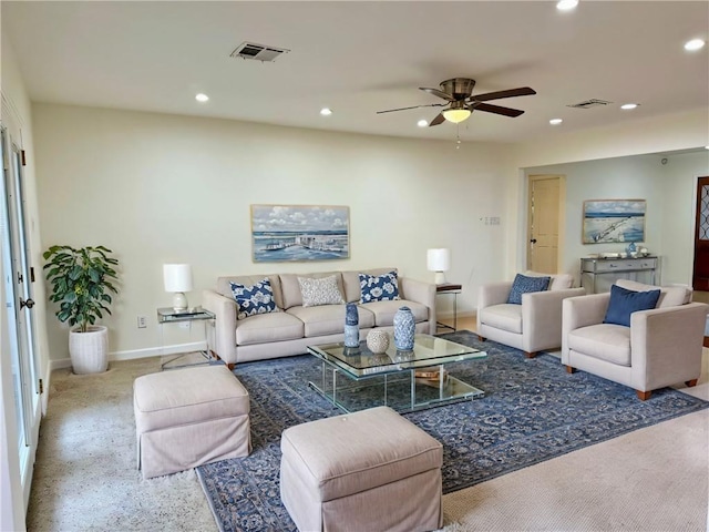 living area featuring ceiling fan, recessed lighting, visible vents, and baseboards