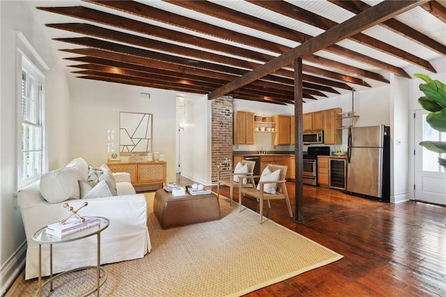 living room with beamed ceiling, dark hardwood / wood-style floors, and wine cooler