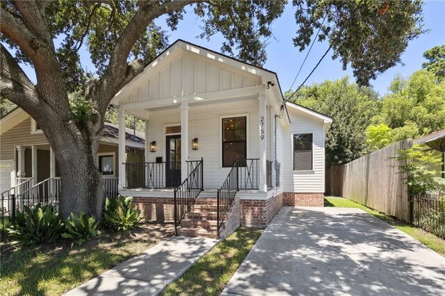 bungalow featuring a porch