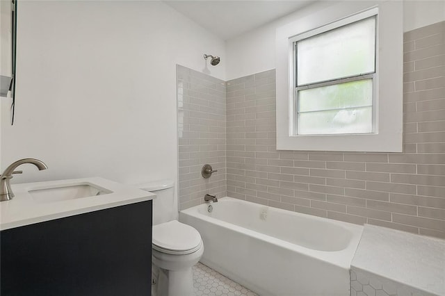 bathroom featuring  shower combination, toilet, tile patterned floors, and vanity