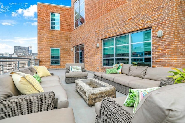 view of patio / terrace with outdoor lounge area and a balcony